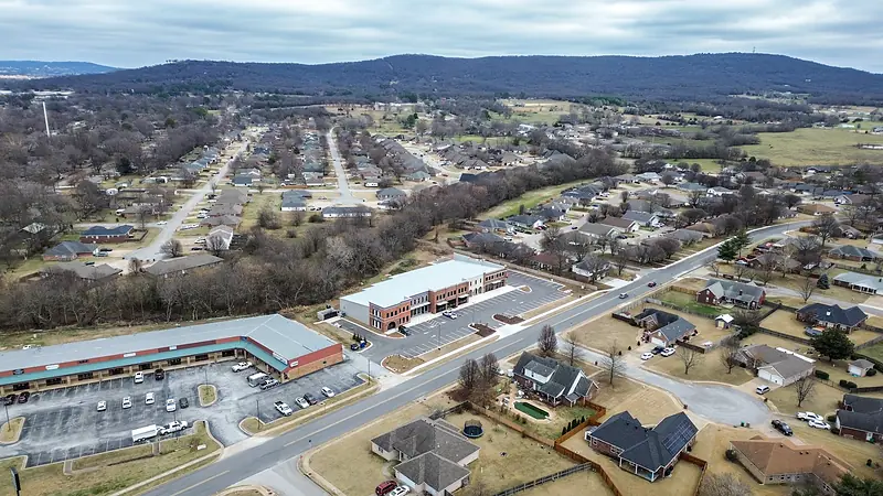 The Ozark hills beyond the neighborhood