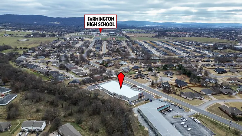 Farmington High School, past the neighborhood