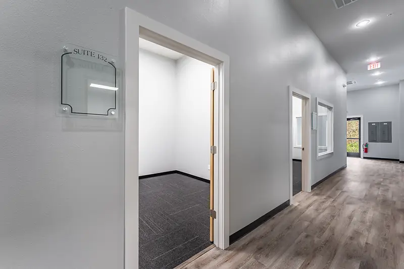 Suite 132: door and nameplate off the main hall