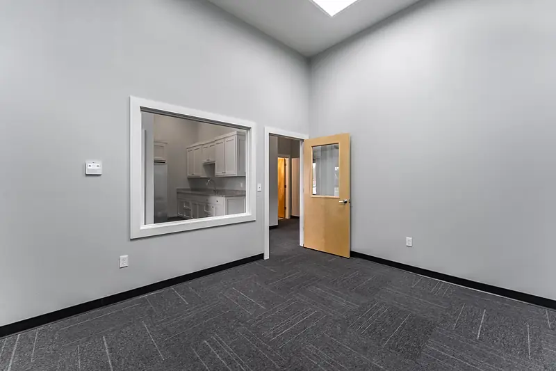 Suite 137: office with a window to the kitchenette