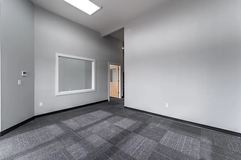 Suite 137: front room with an interior window