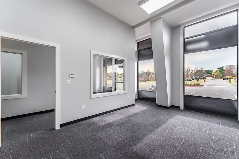 Suite 137: storefront windows on the front walk