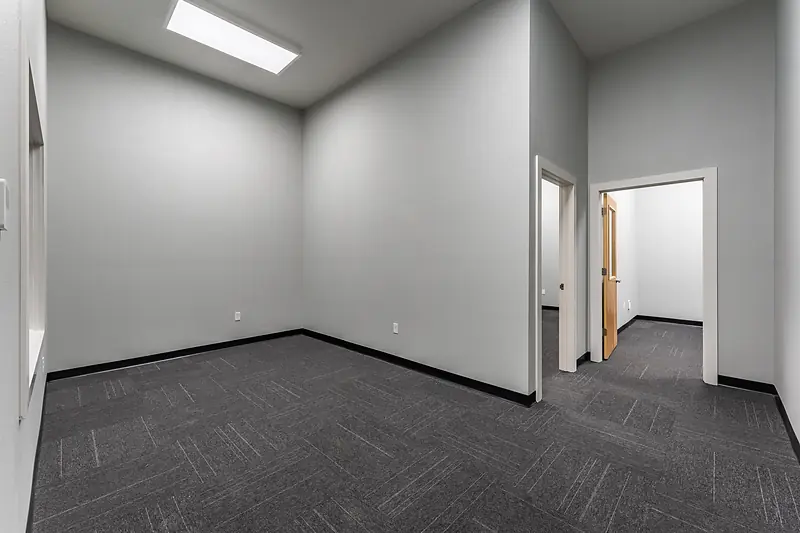 Suite 138: reception area, with doors to the two private offices
